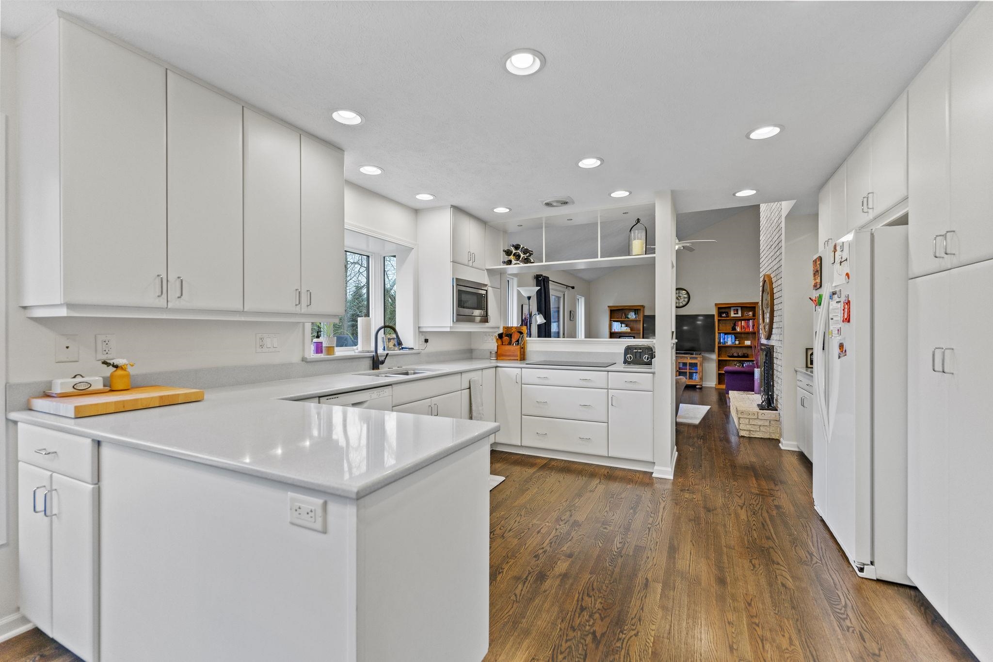 1628 Riverside Road Belvidere, IL 61008 - Photo 15 of 47 a kitchen with stainless steel appliances granite countertop a refrigerator and a sink