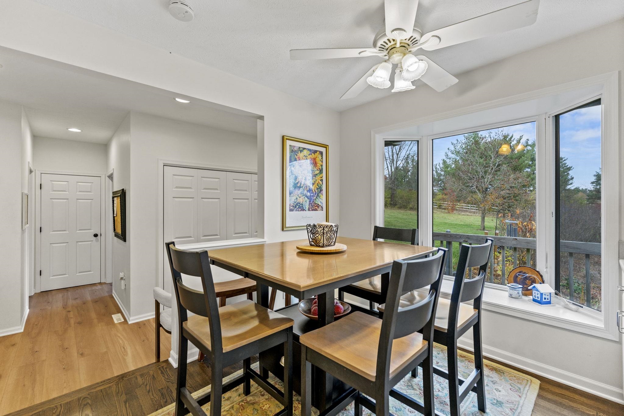 1628 Riverside Road Belvidere, IL 61008 - Photo 16 of 47 a view of a dining room with furniture window and outside view