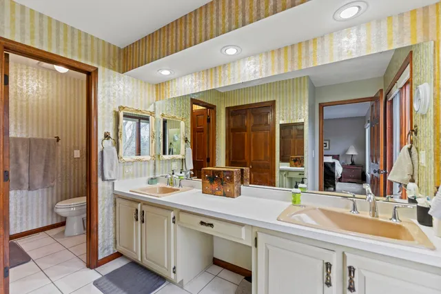 a large kitchen with a large window