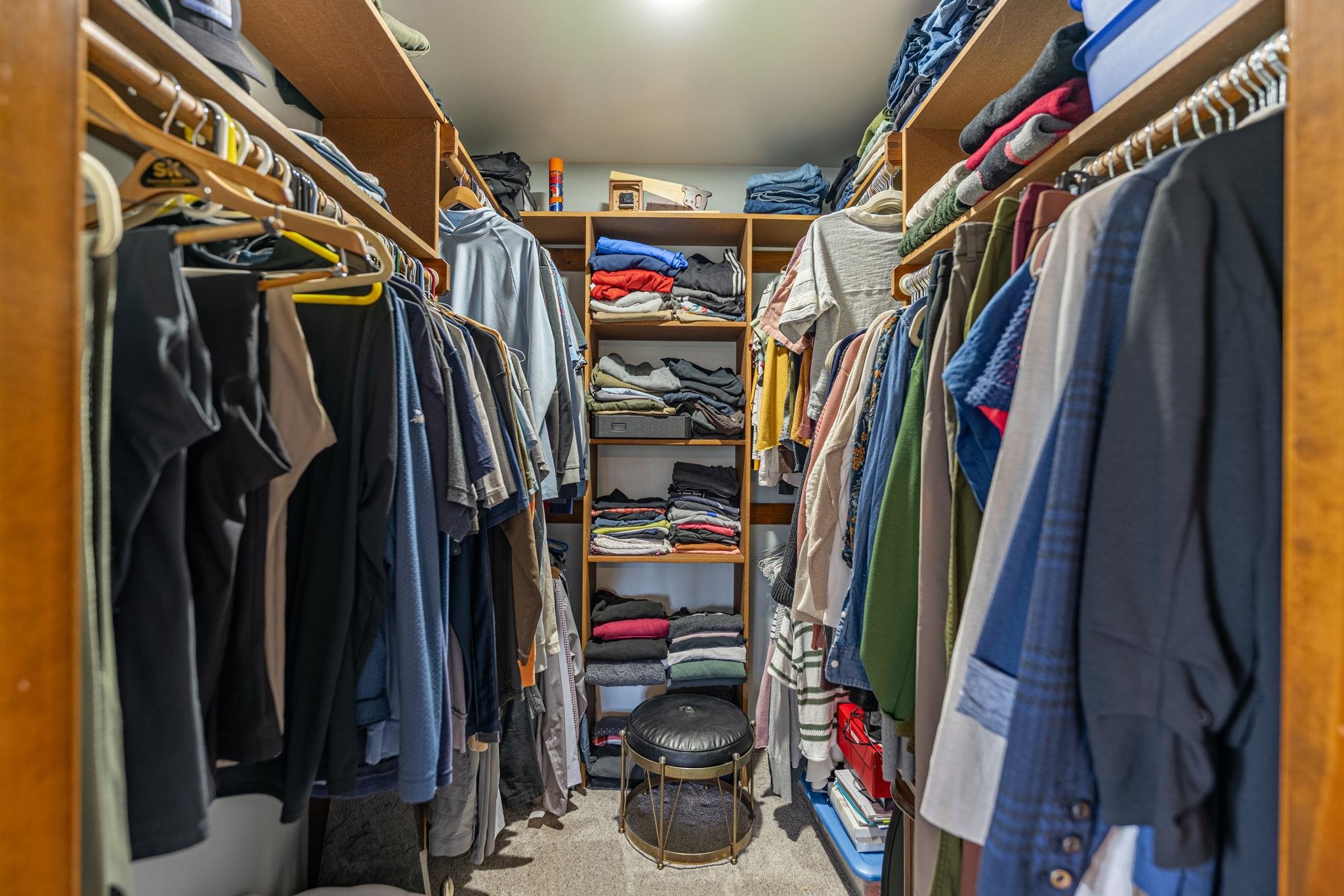 1628 Riverside Road Belvidere, IL 61008 - Photo 25 of 47 a view of walk in closet with clothes