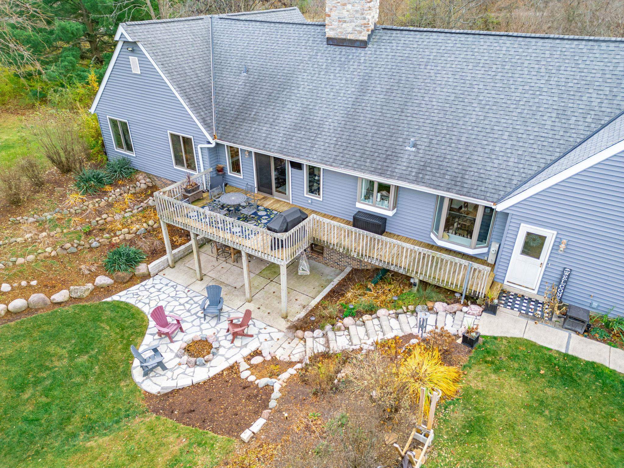1628 Riverside Road Belvidere, IL 61008 - Photo 39 of 47 a aerial view of a house with table and chairs