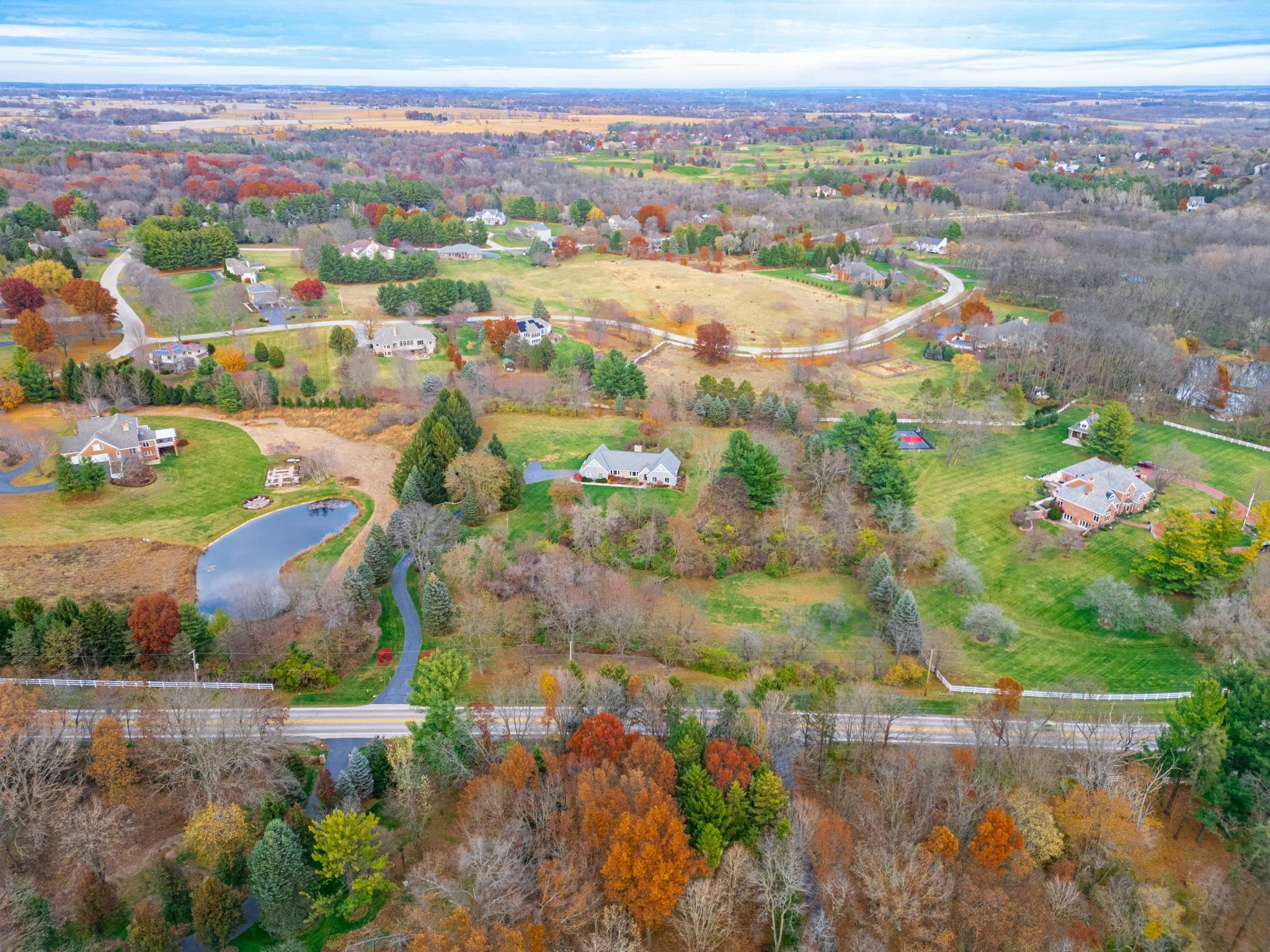 1628 Riverside Road Belvidere, IL 61008 - Photo 5 of 47 an aerial view of residential houses with outdoor space and street view
