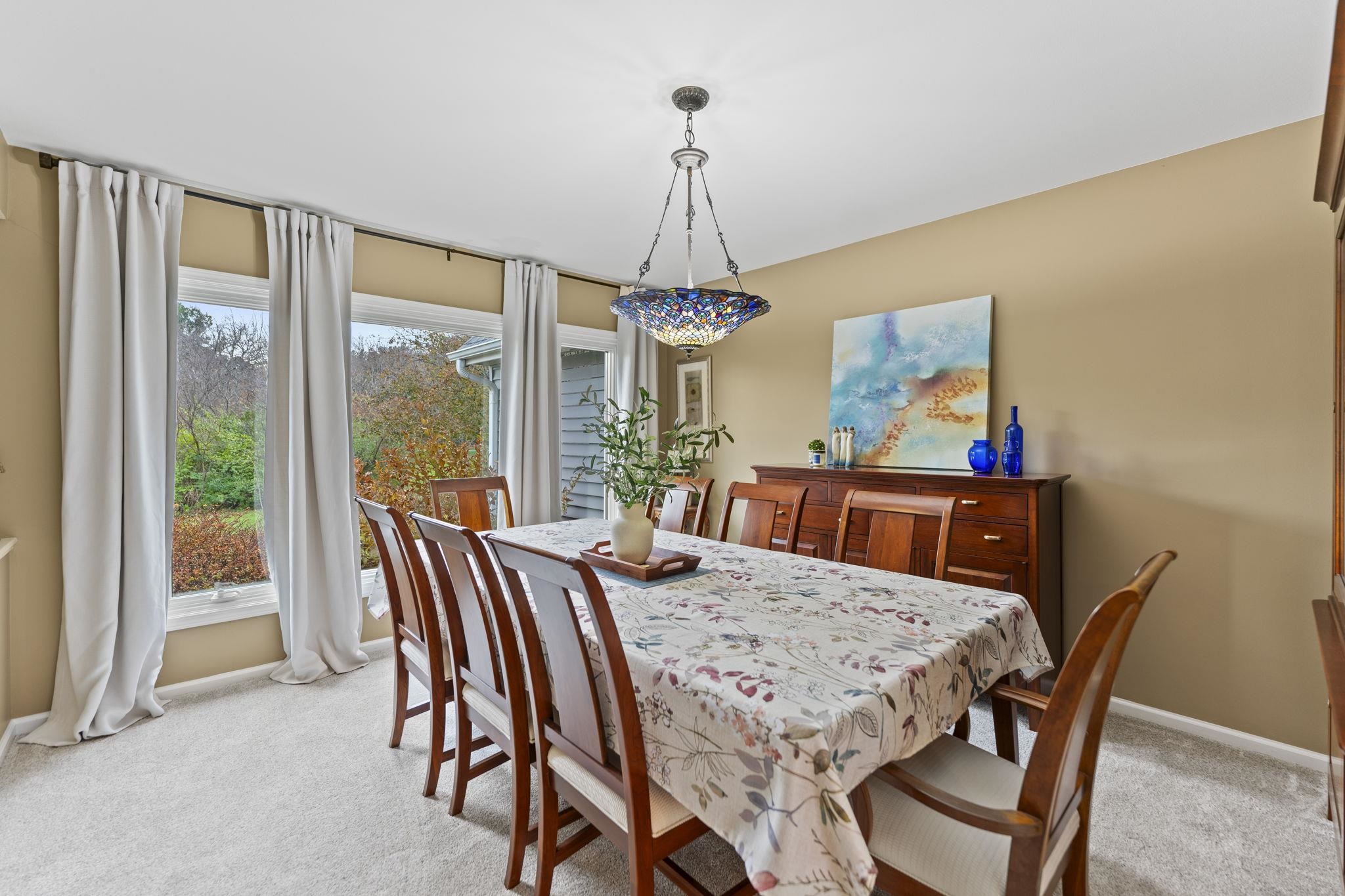 1628 Riverside Road Belvidere, IL 61008 - Photo 9 of 47 a view of a dining room with furniture window and outside view