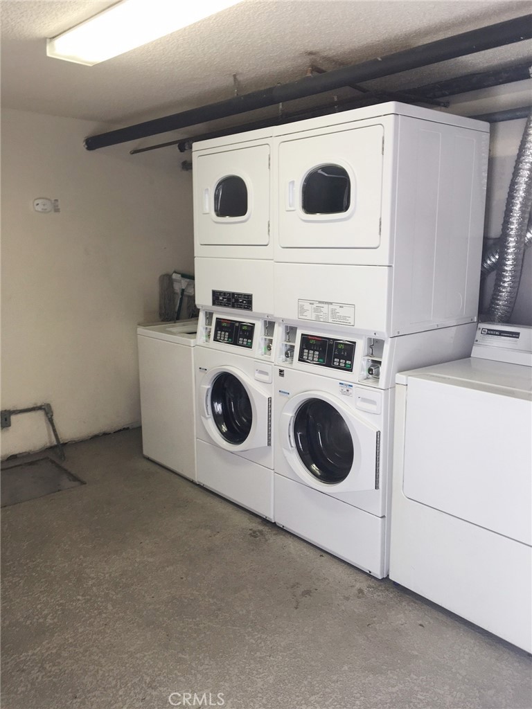 4533 Colbath Avenue, Unit 20 Sherman Oaks, CA 91423 - Photo 22 of 22 a utility room with dryer and washer