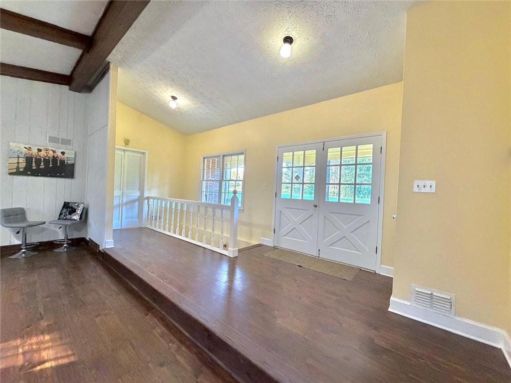 665 Arnold Road Lawrenceville, GA 30044 - Photo 15 of 48 a view of an entryway with wooden floor and windows