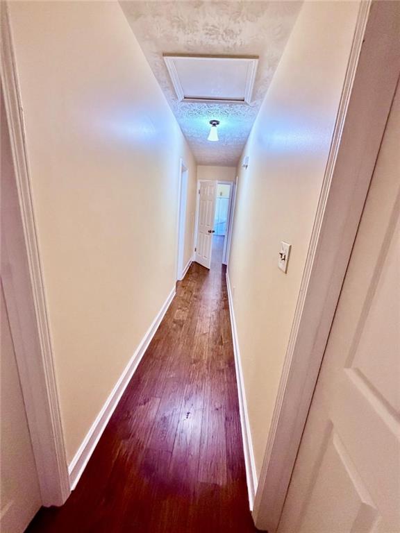 665 Arnold Road Lawrenceville, GA 30044 - Photo 26 of 48 a view of a hallway with wooden floor