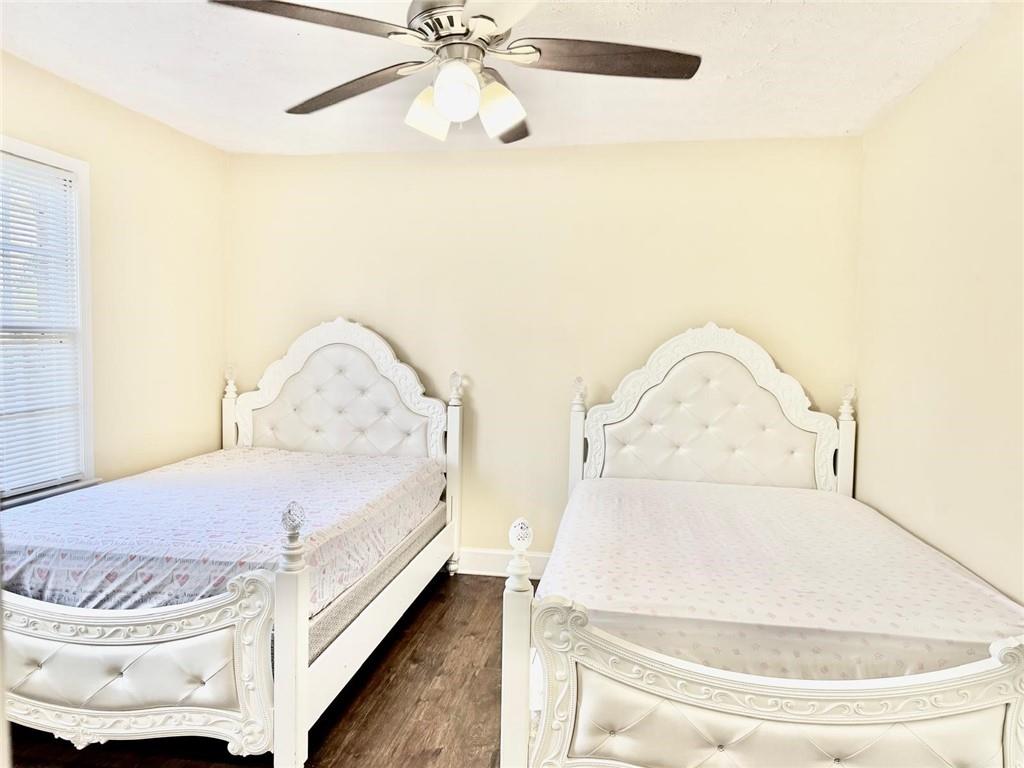 665 Arnold Road Lawrenceville, GA 30044 - Photo 28 of 48 a living room with a bed