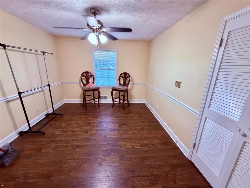 665 Arnold Road Lawrenceville, GA 30044 - Photo 33 of 48 a view of a livingroom with furniture and hardwood floor