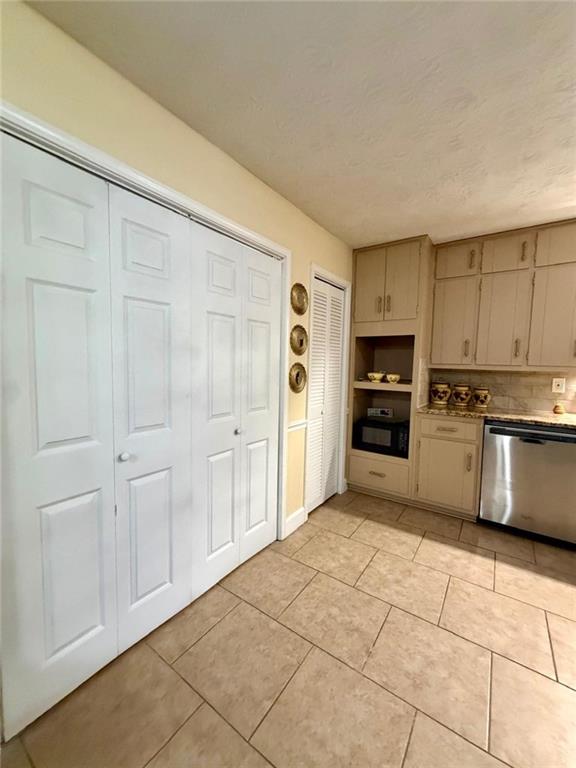 665 Arnold Road Lawrenceville, GA 30044 - Photo 36 of 48 a large kitchen with cabinets and stainless steel appliances