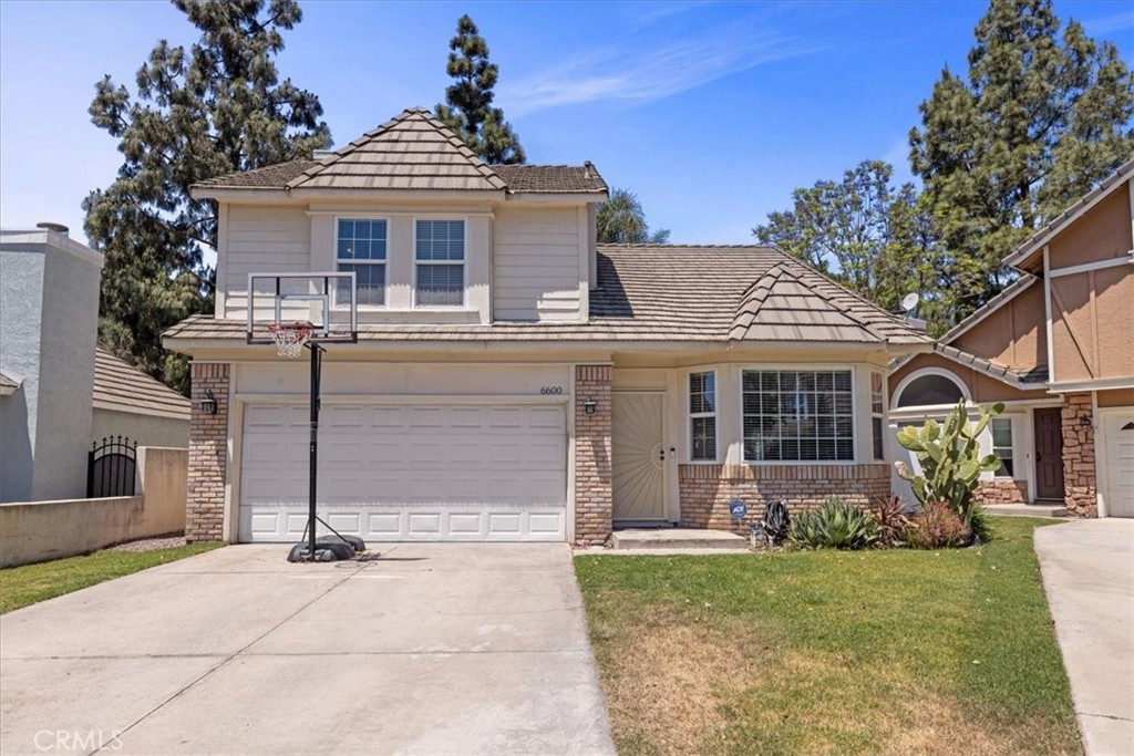 6600 Montresor Place Rancho Cucamonga, CA 91737 - Photo 1 of 1 front view of a house with a yard