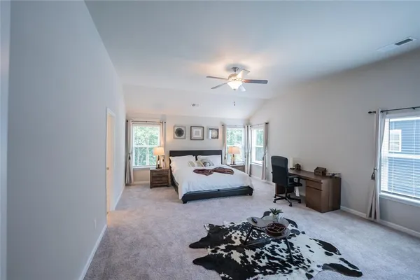 a living room with furniture and decor