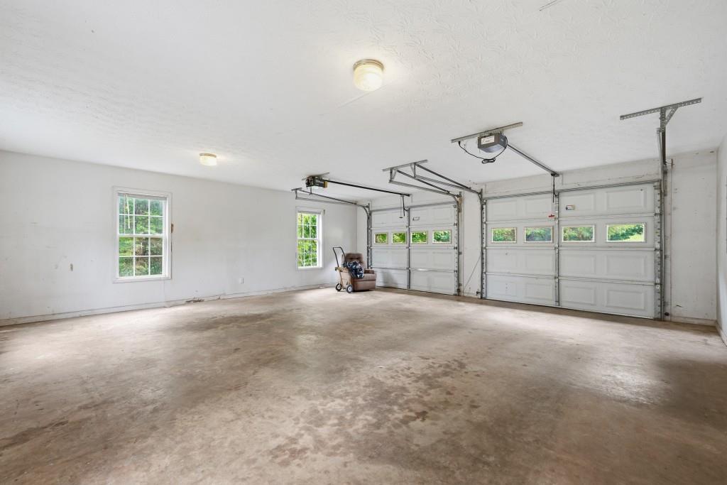 176 Big Oak Tree Road Northwest Adairsville, GA 30103 - Photo 45 of 77 a view of empty room with front door