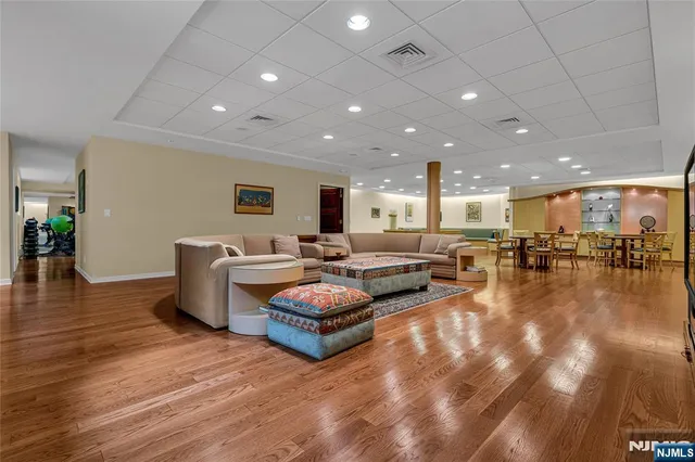 a living room with furniture and a table