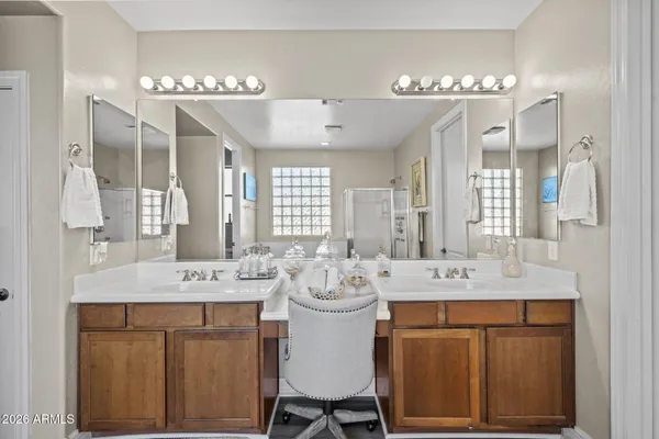 a dining room with granite countertop a sink dishwasher a dining table and chairs