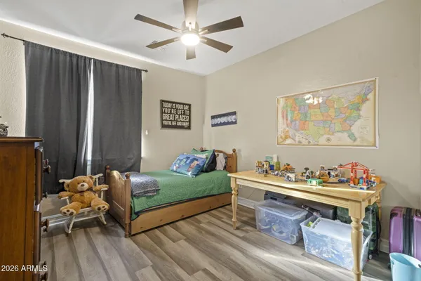 a bed room with furniture and a window