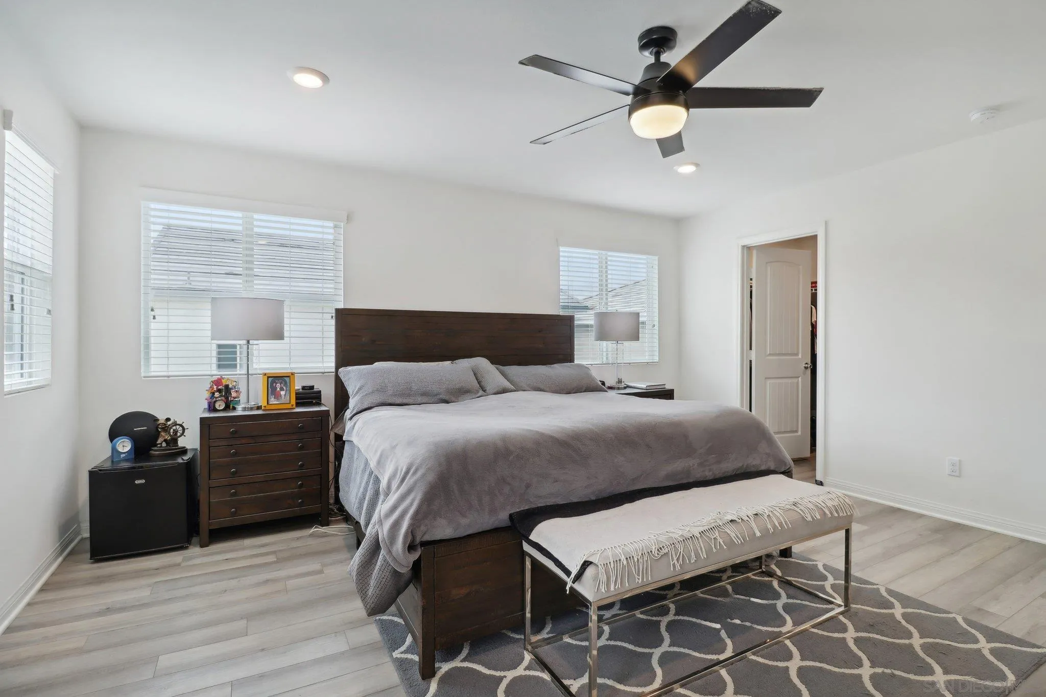 10645 Rhodes Lane Spring Valley, CA 91978 - Photo 23 of 38 a bedroom with a bed and a closet
