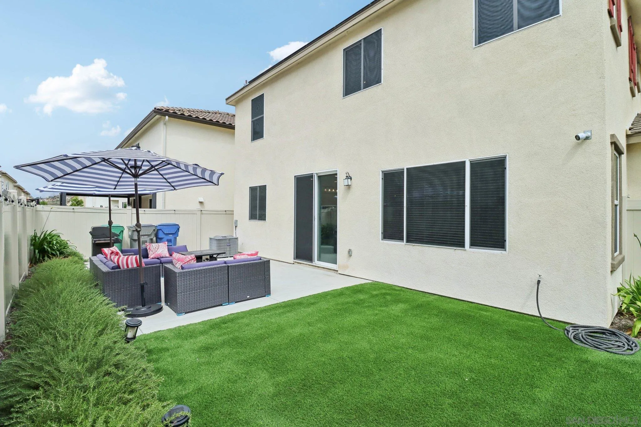 10645 Rhodes Lane Spring Valley, CA 91978 - Photo 34 of 38 a view of a house with backyard and sitting area
