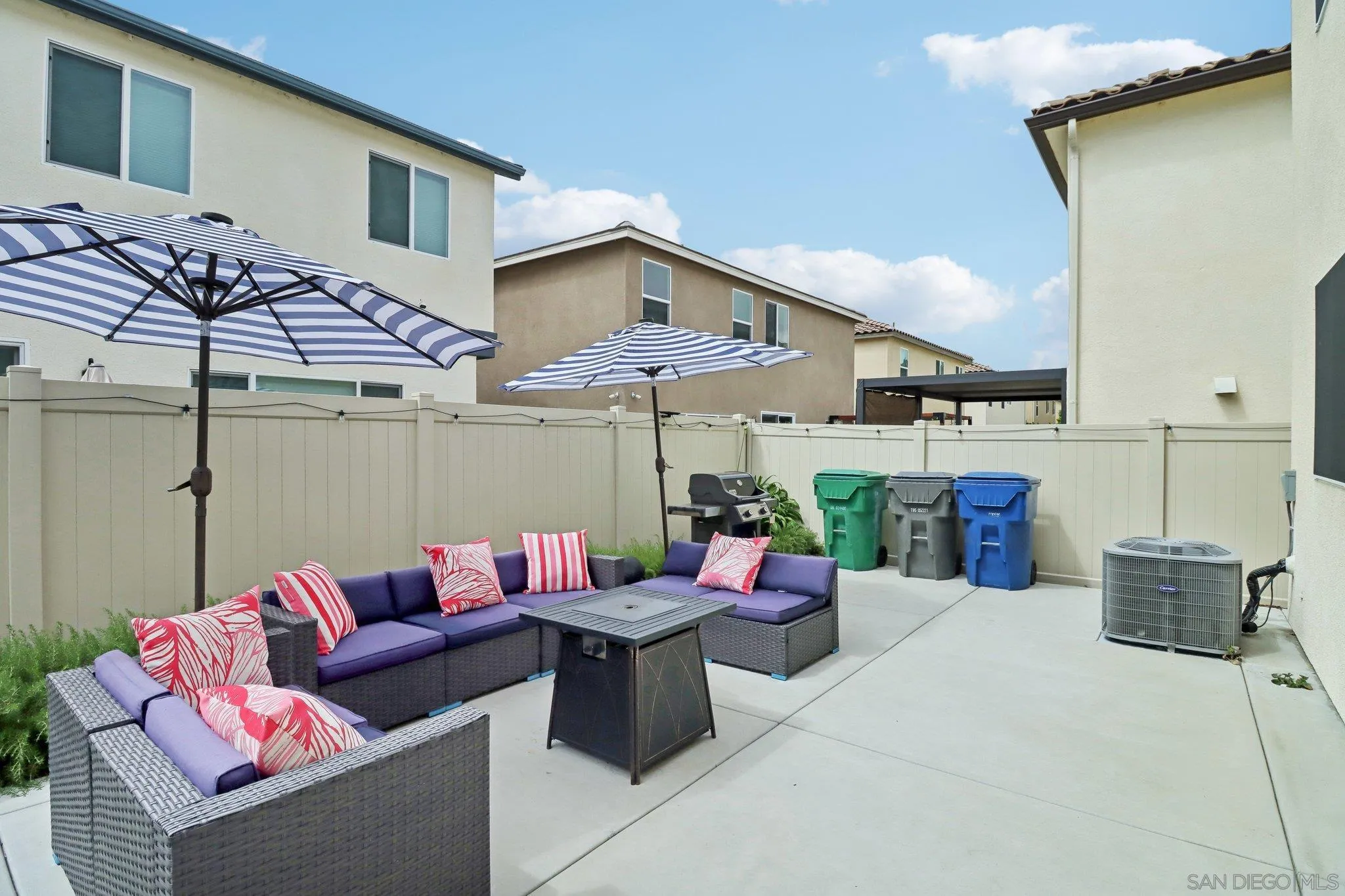 10645 Rhodes Lane Spring Valley, CA 91978 - Photo 35 of 38 a view of a patio with couches and potted plants
