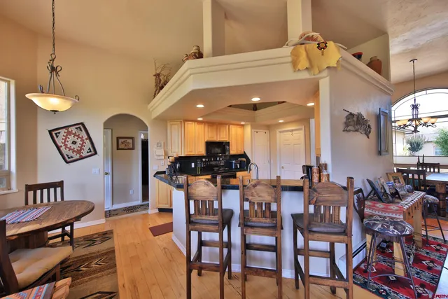 a view of a dining room with furniture