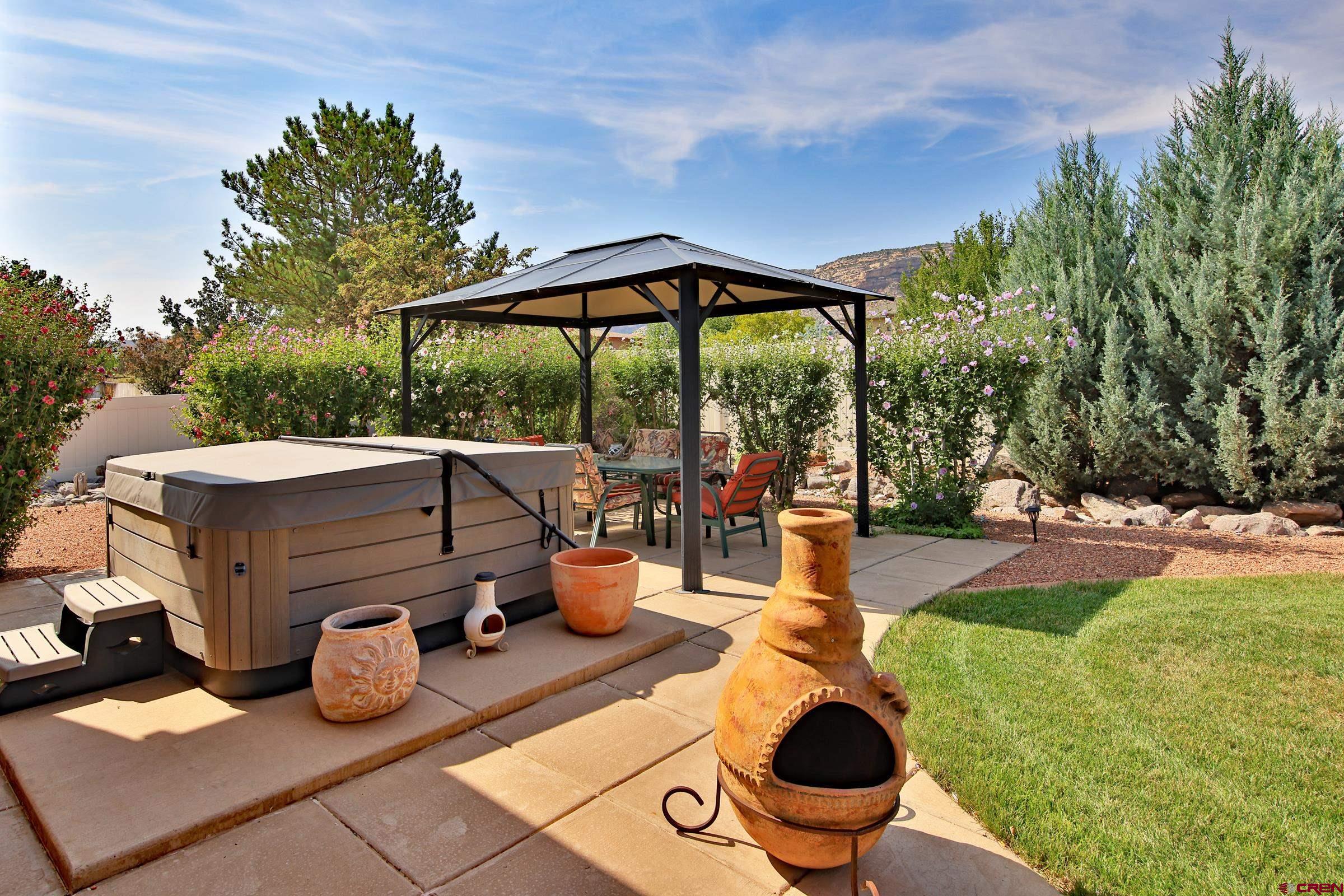 339 Canyon Rim Court Grand Junction, CO 81507 - Photo 27 of 40 a view of a patio with chairs and plants