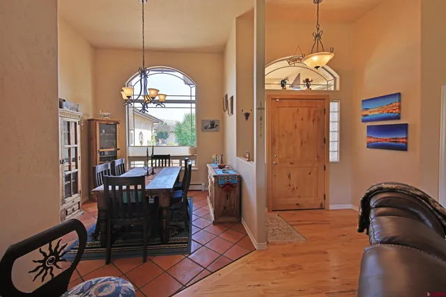 a view of a dining room with furniture window and outside view