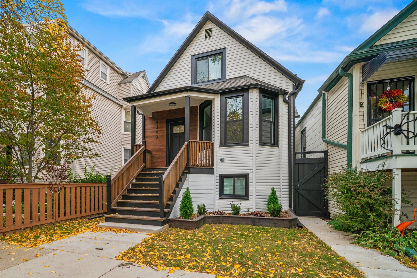 4143 North Drake Avenue Chicago, IL 60618 - Photo 2 of 40 a front view of a house with balcony