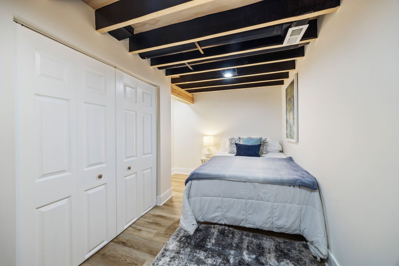 4143 North Drake Avenue Chicago, IL 60618 - Photo 32 of 40 a bedroom with a bed and closet