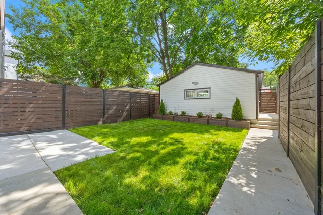 a view of backyard with green space