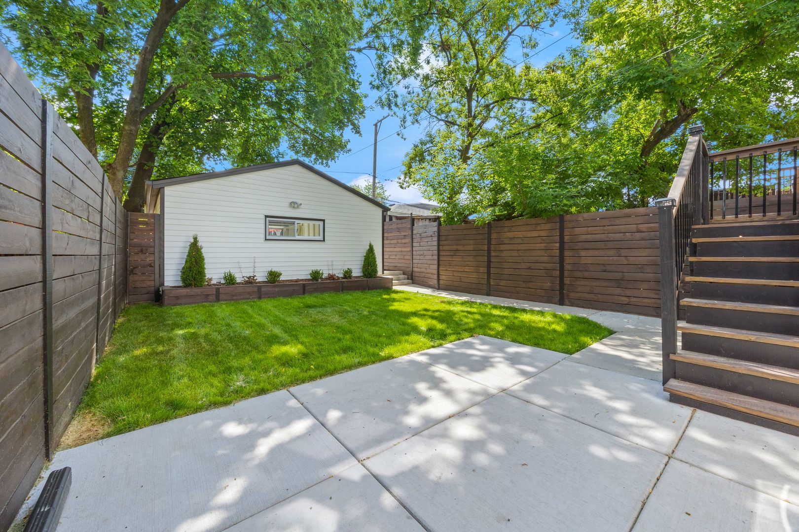 4143 North Drake Avenue Chicago, IL 60618 - Photo 38 of 40 a view of backyard with green space