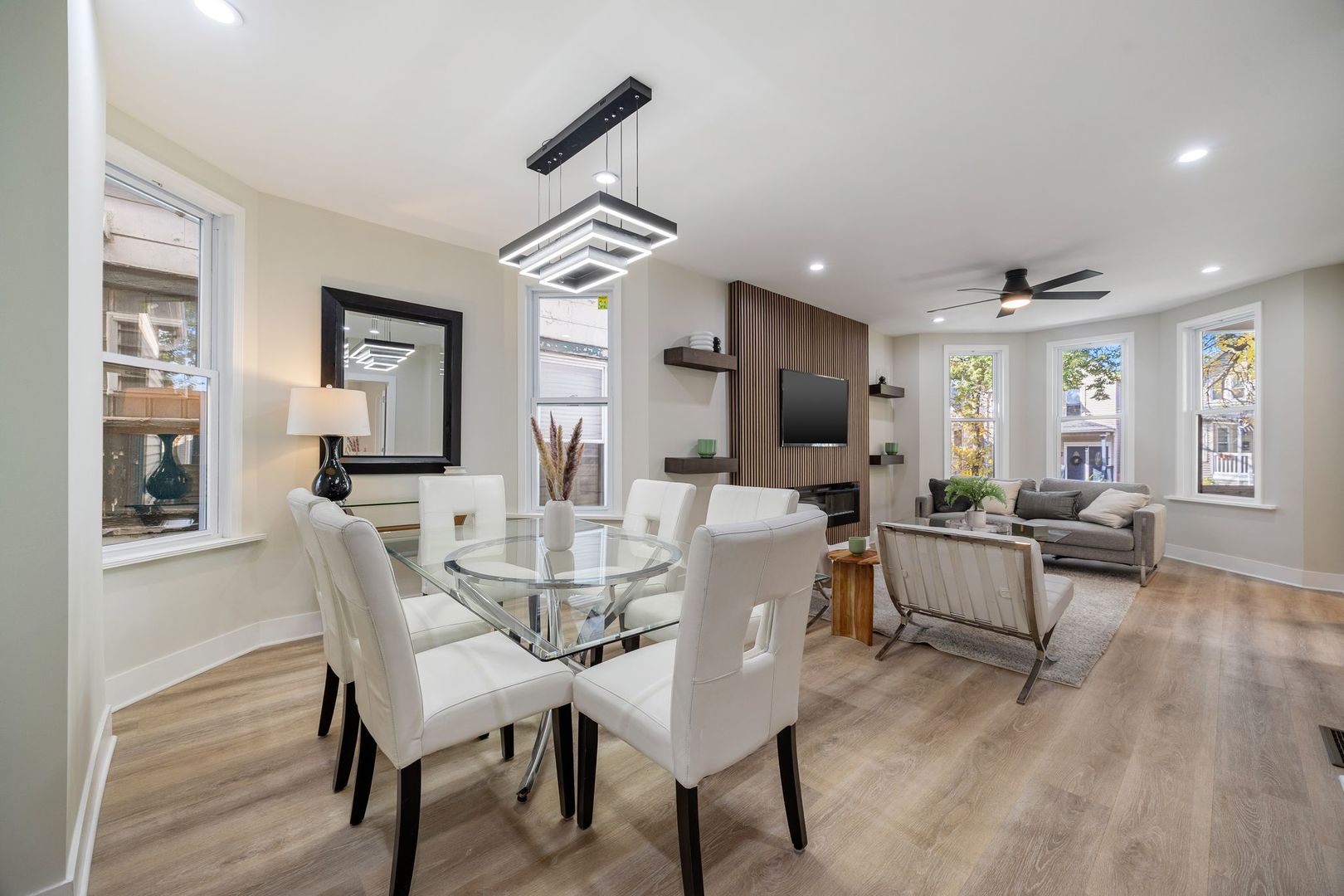 4143 North Drake Avenue Chicago, IL 60618 - Photo 8 of 40 a view of a dining room with furniture window and wooden floor