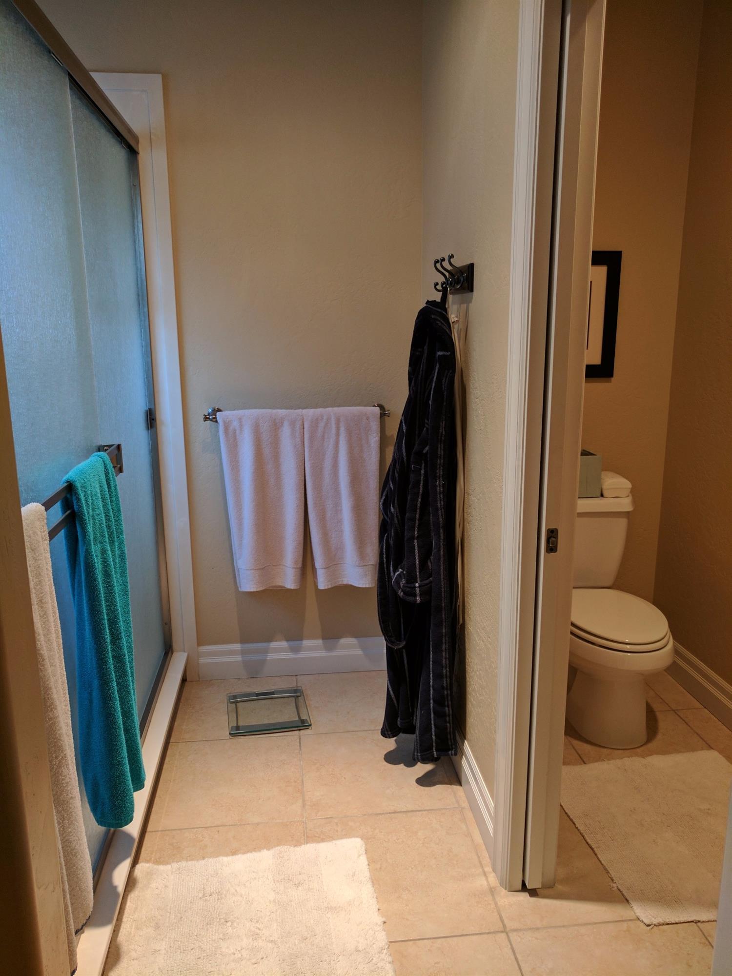815 Buck Point Street Central Point, OR 97502 - Photo 13 of 15 a bathroom with a toilet and a shower