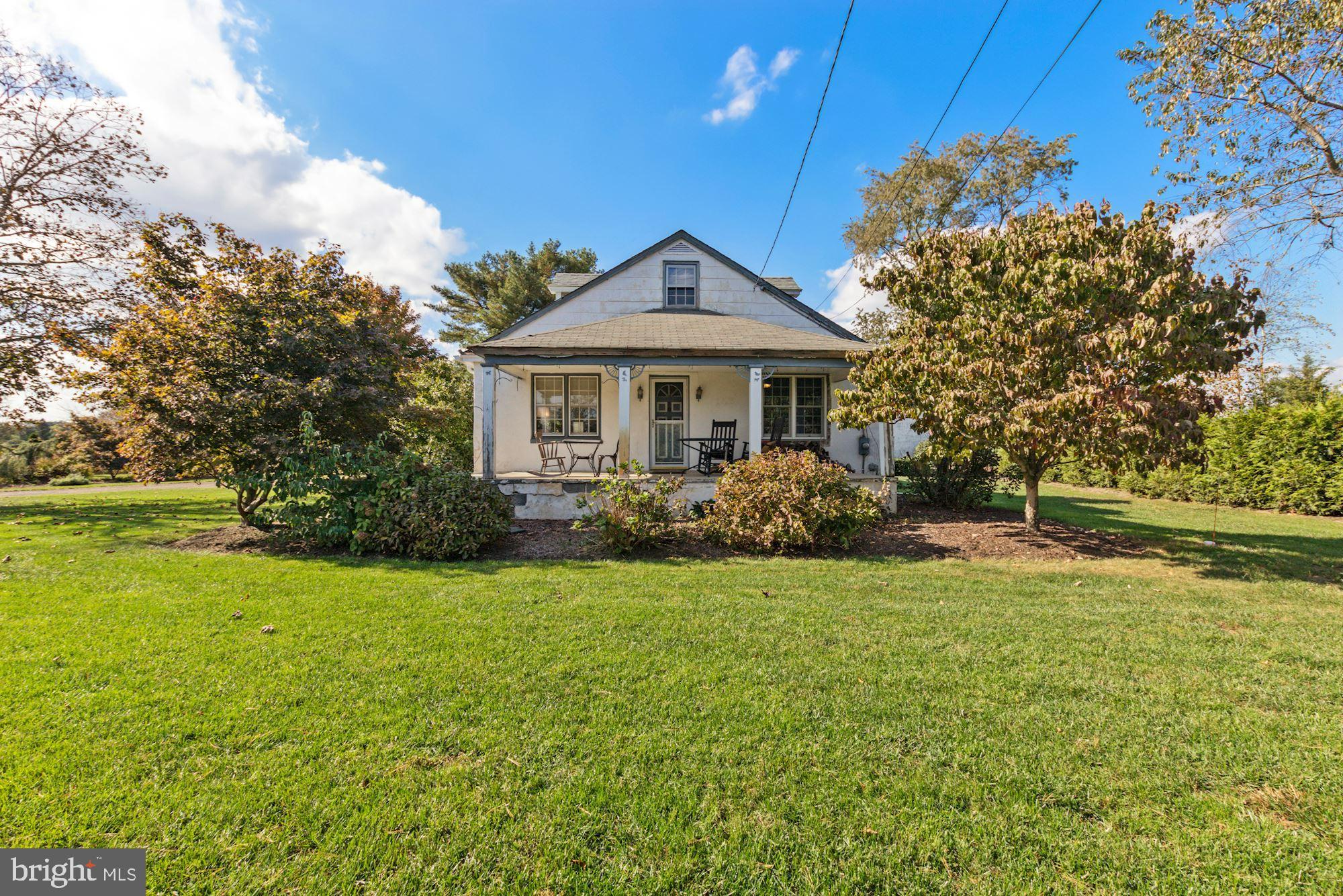 87 Eayrestown Road Medford, NJ 08055 - Photo 1 of 37 a front view of a house with a yard