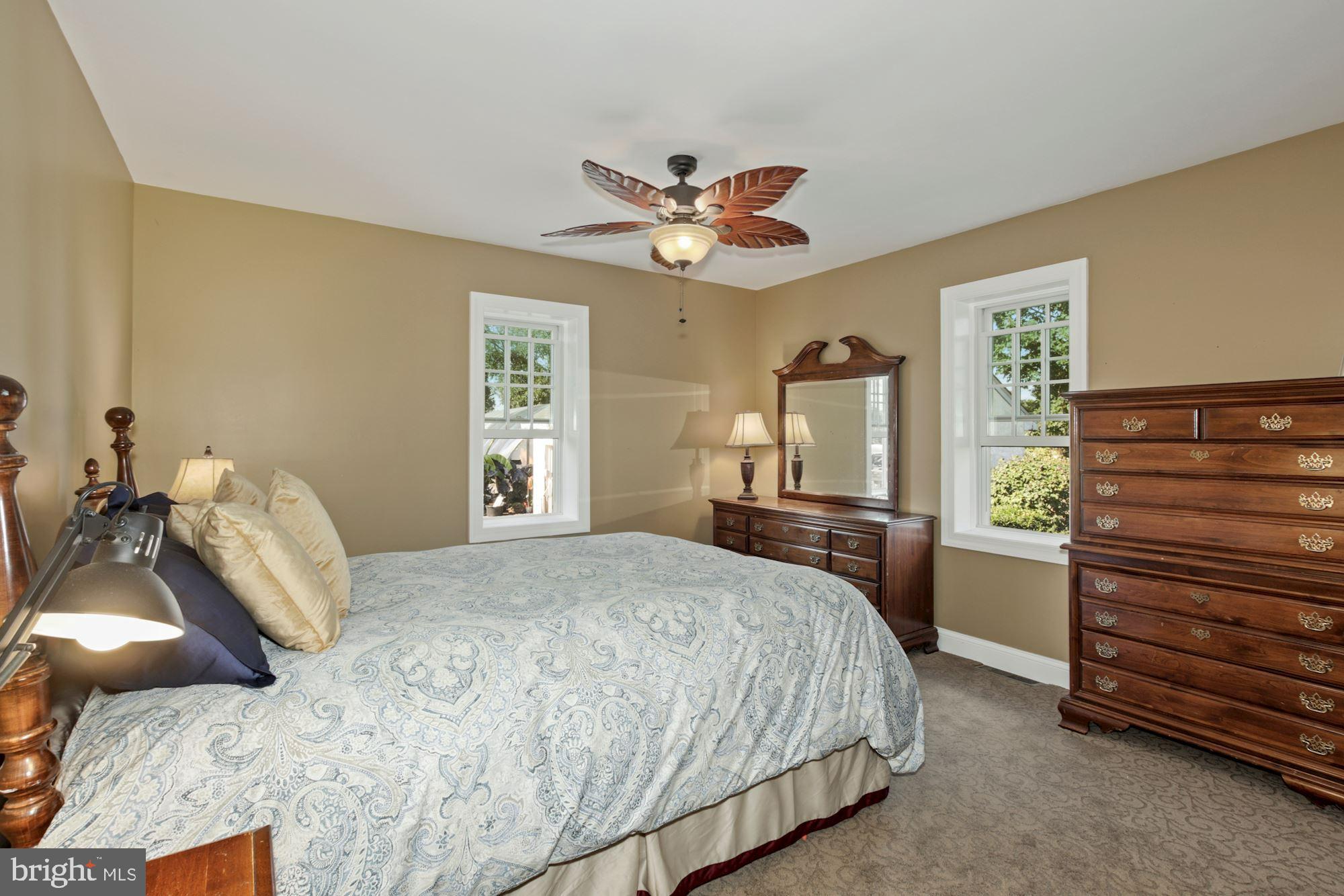 87 Eayrestown Road Medford, NJ 08055 - Photo 18 of 37 a bedroom with a bed and a dresser