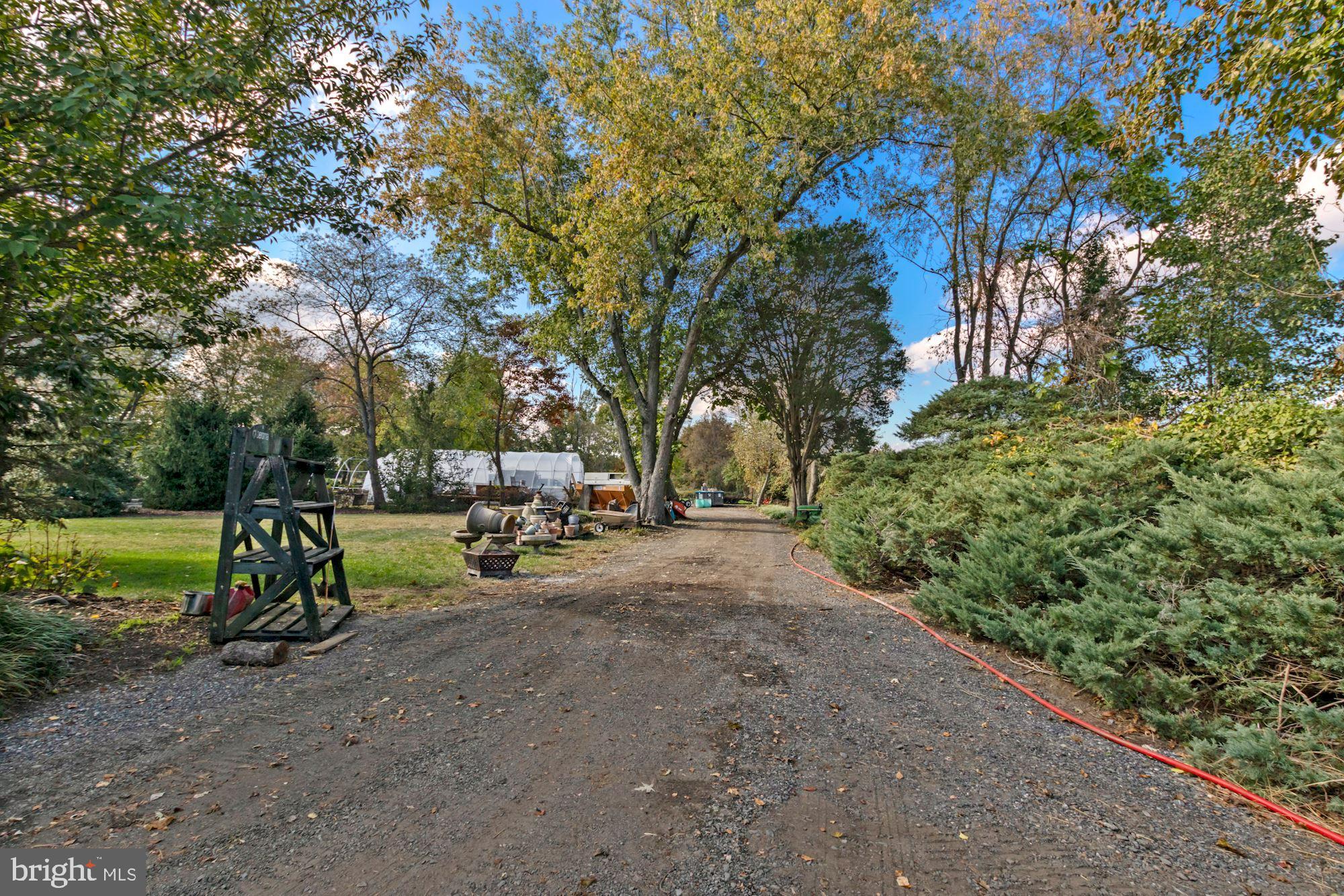 87 Eayrestown Road Medford, NJ 08055 - Photo 3 of 37 a view of a park with large trees
