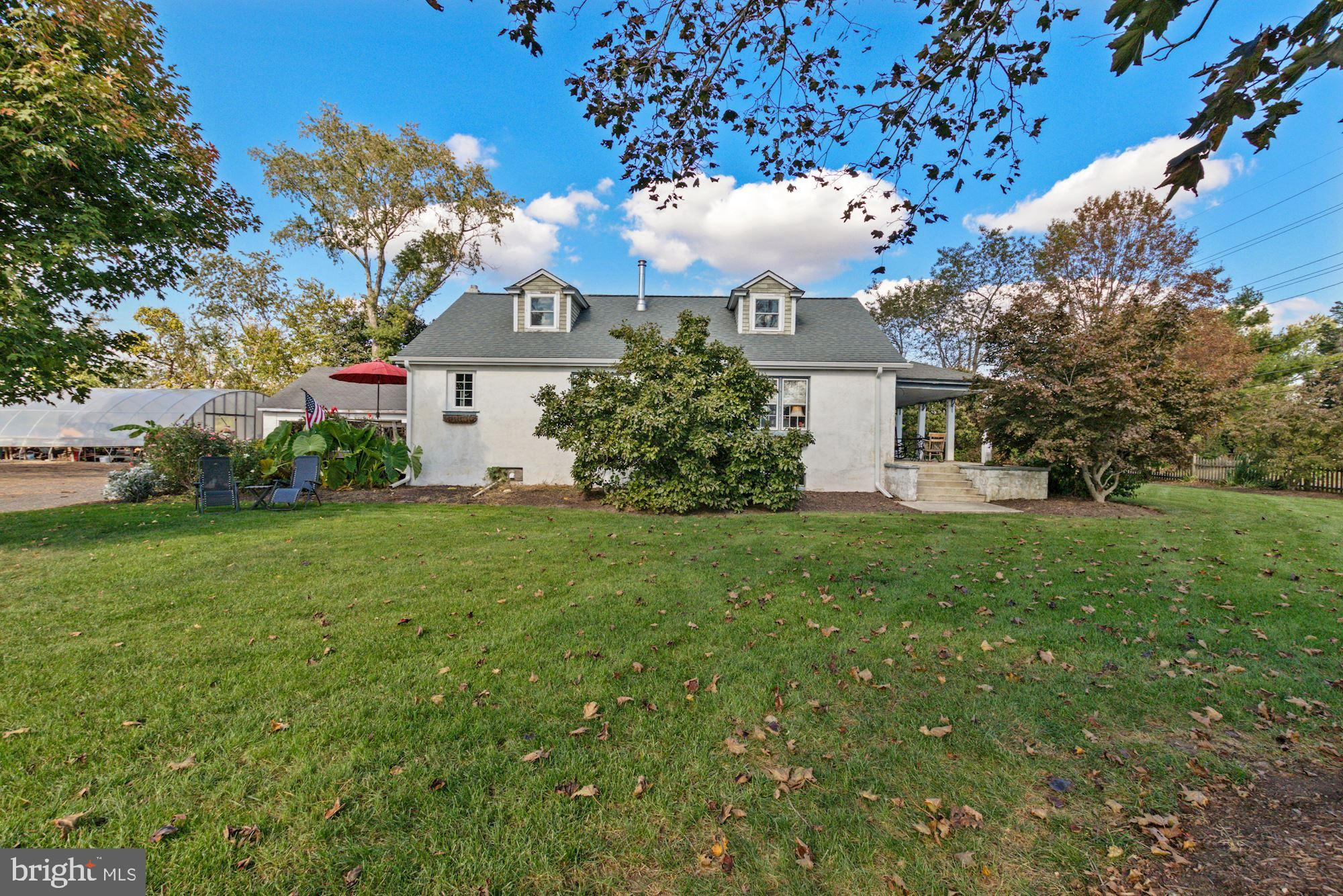 87 Eayrestown Road Medford, NJ 08055 - Photo 30 of 37 a front view of a house with garden