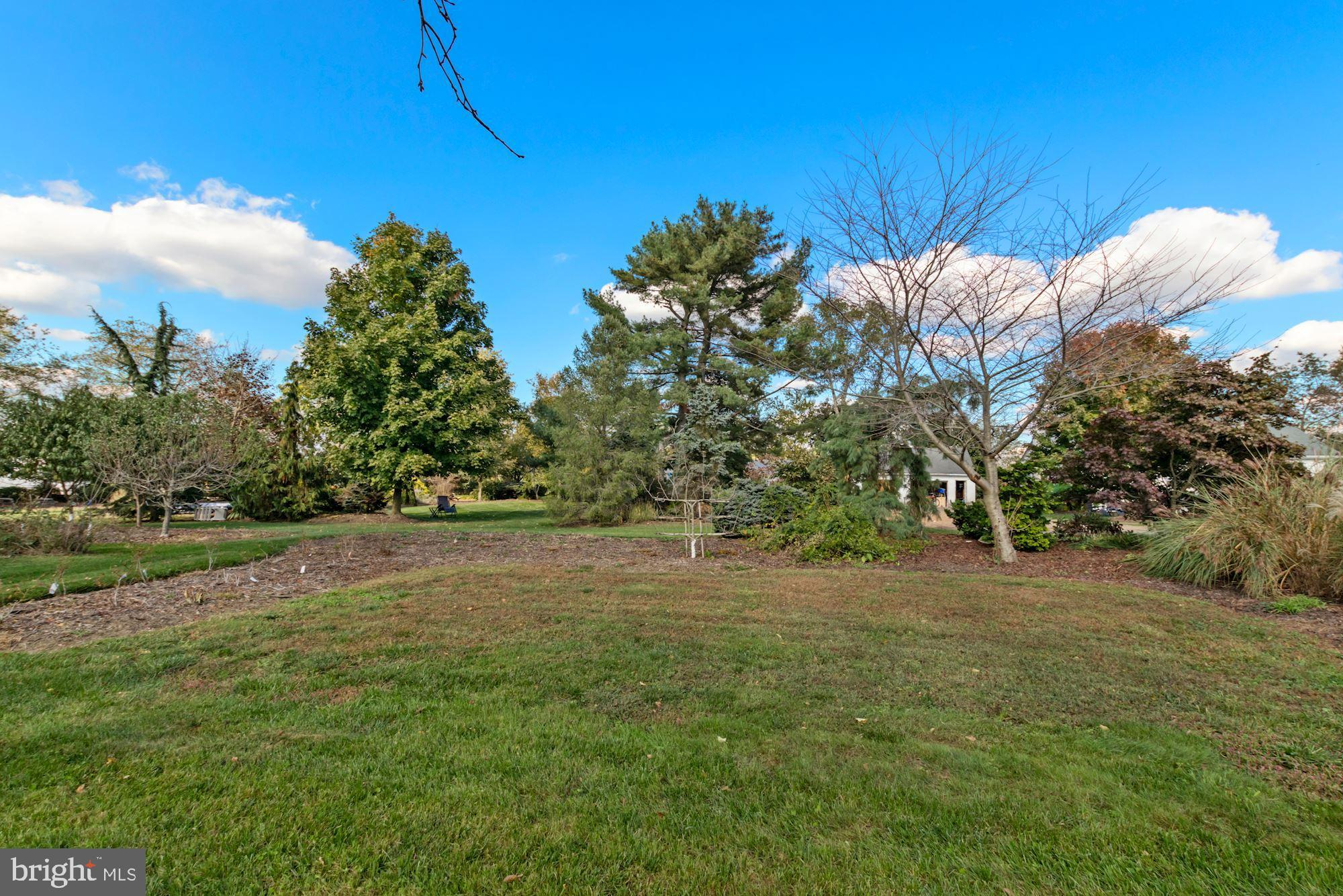 87 Eayrestown Road Medford, NJ 08055 - Photo 33 of 37 a backyard of a house with lots of green space