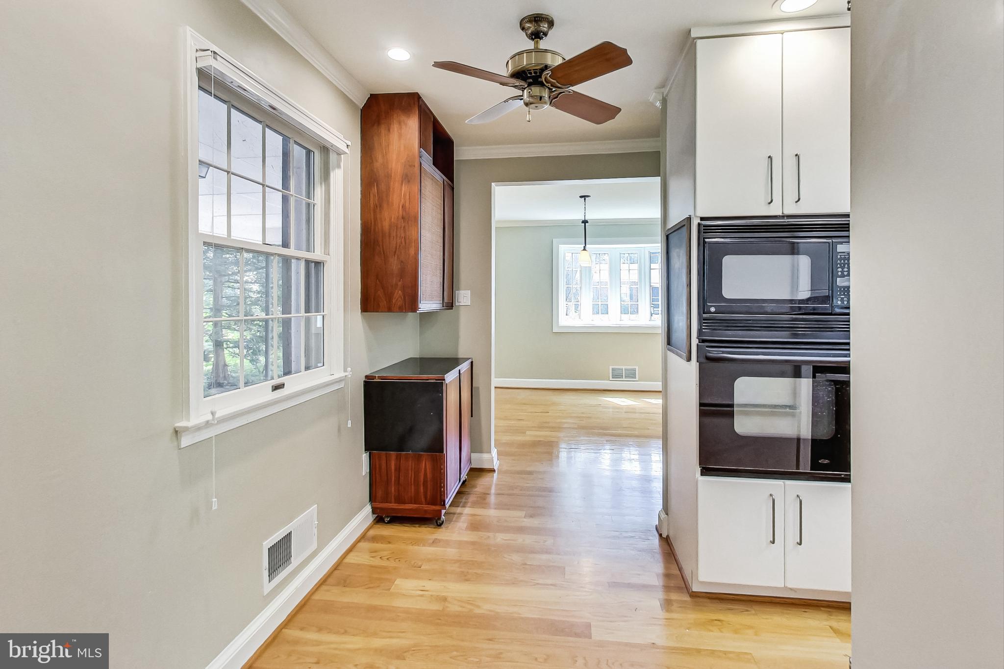 4513 Puller Drive Kensington, MD 20895 - Photo 14 of 46 a view of an entryway with wooden floor