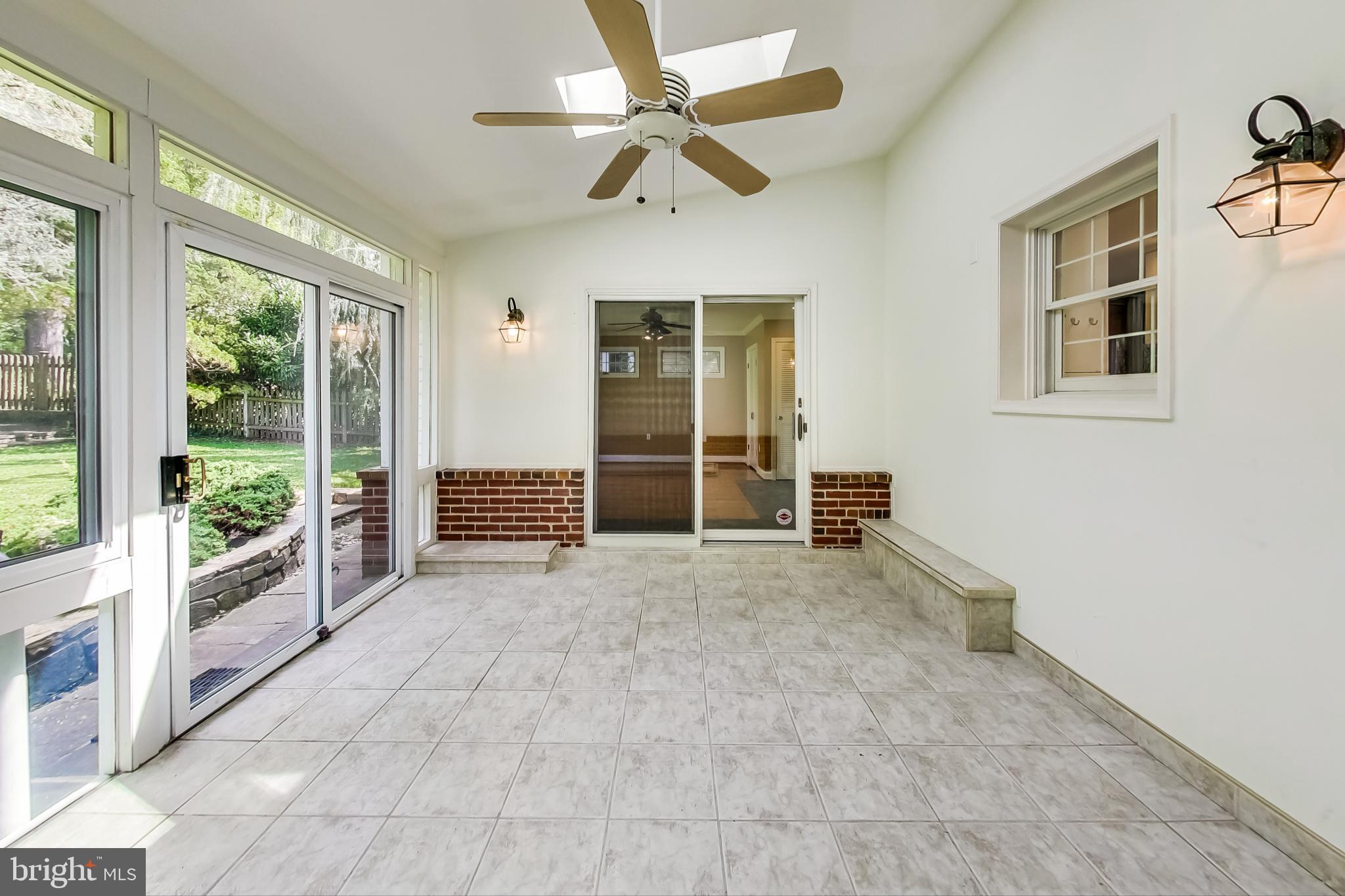 4513 Puller Drive Kensington, MD 20895 - Photo 20 of 46 a view of an empty room with a window and balcony