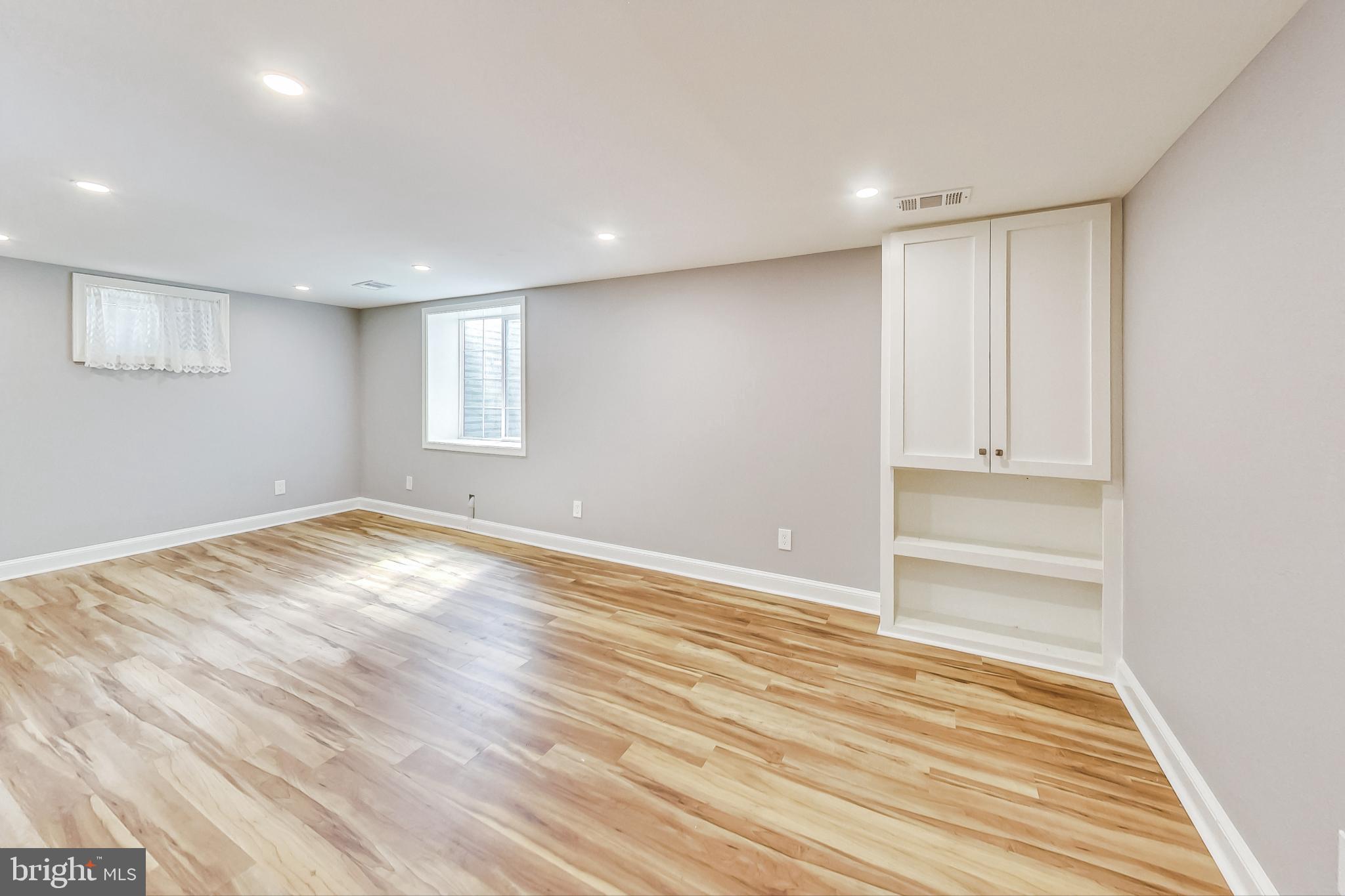4513 Puller Drive Kensington, MD 20895 - Photo 30 of 46 a view of empty room with wooden floor