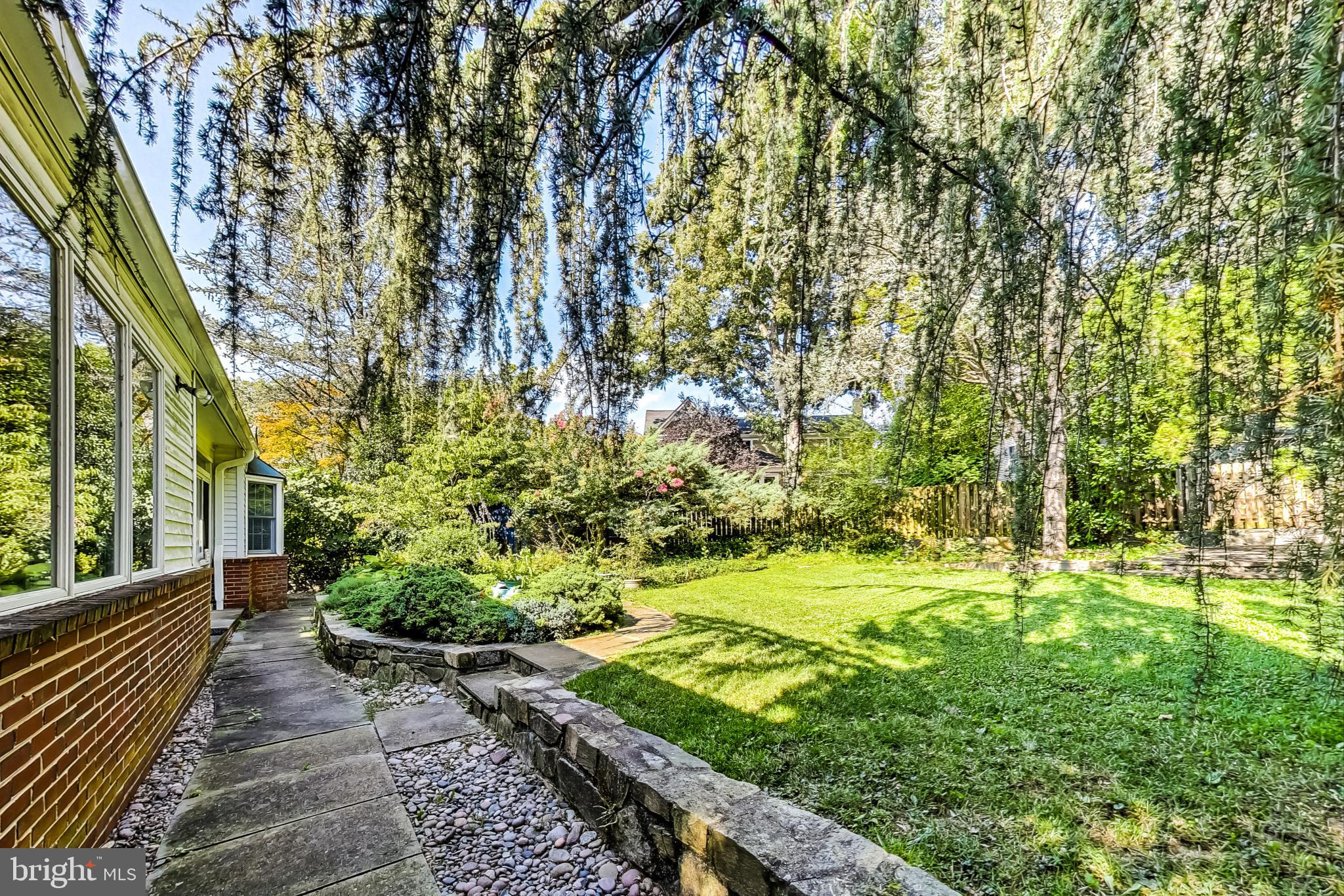 4513 Puller Drive Kensington, MD 20895 - Photo 39 of 46 a view of a yard with plants and trees