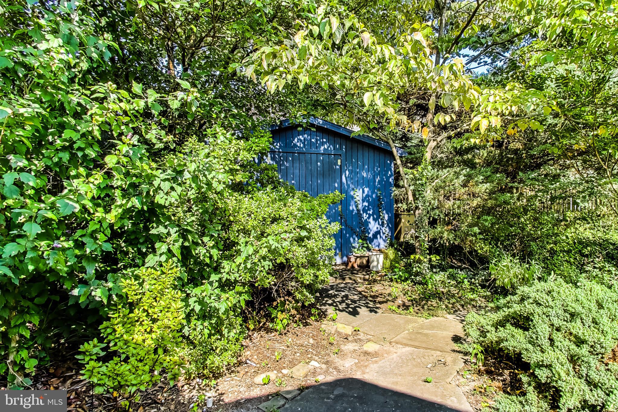 4513 Puller Drive Kensington, MD 20895 - Photo 46 of 46 a backyard of a house with lots of green space