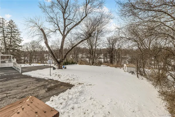 a view of snow on the road