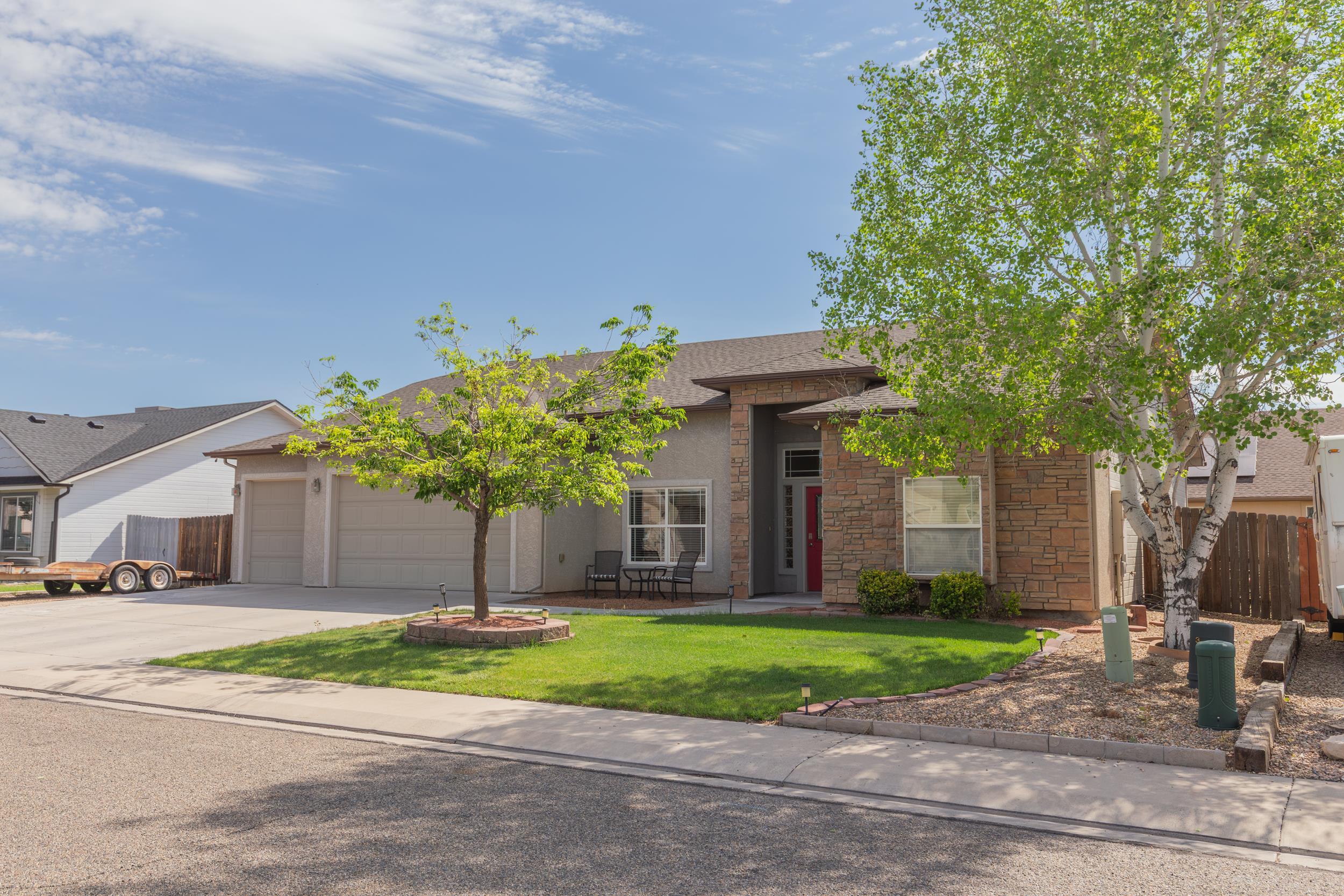 544 Hemlock Drive Fruita, CO 81521 - Photo 3 of 36 a house view with a outdoor space