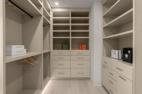 a view of staircase with white walls and windows