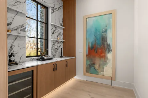 a bathroom with a double vanity sink mirror and shower