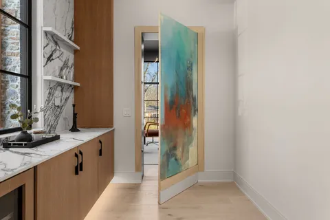 a bathroom with a double vanity sink and a mirror