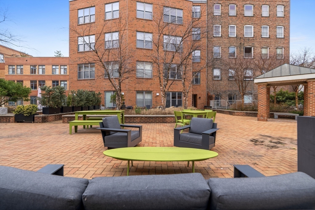 40 Fay Street, Unit 406 Boston, MA 02118 - Photo 18 of 19 a view of a swimming pool with a patio