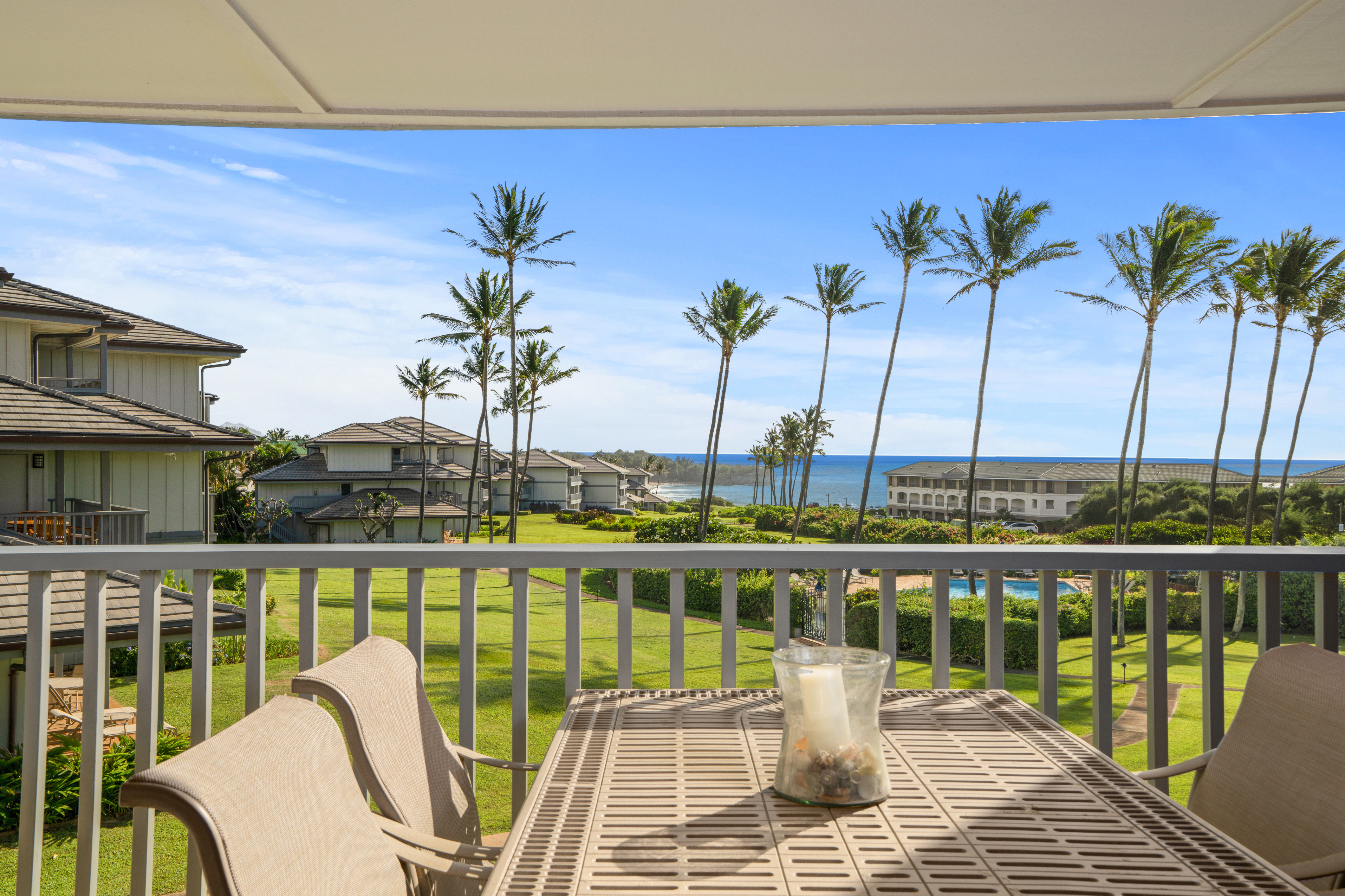 1565 Pe'e Road, Unit 125 Koloa, HI 96756 - Photo 1 of 20 a view of a balcony with lake view and a ocean view