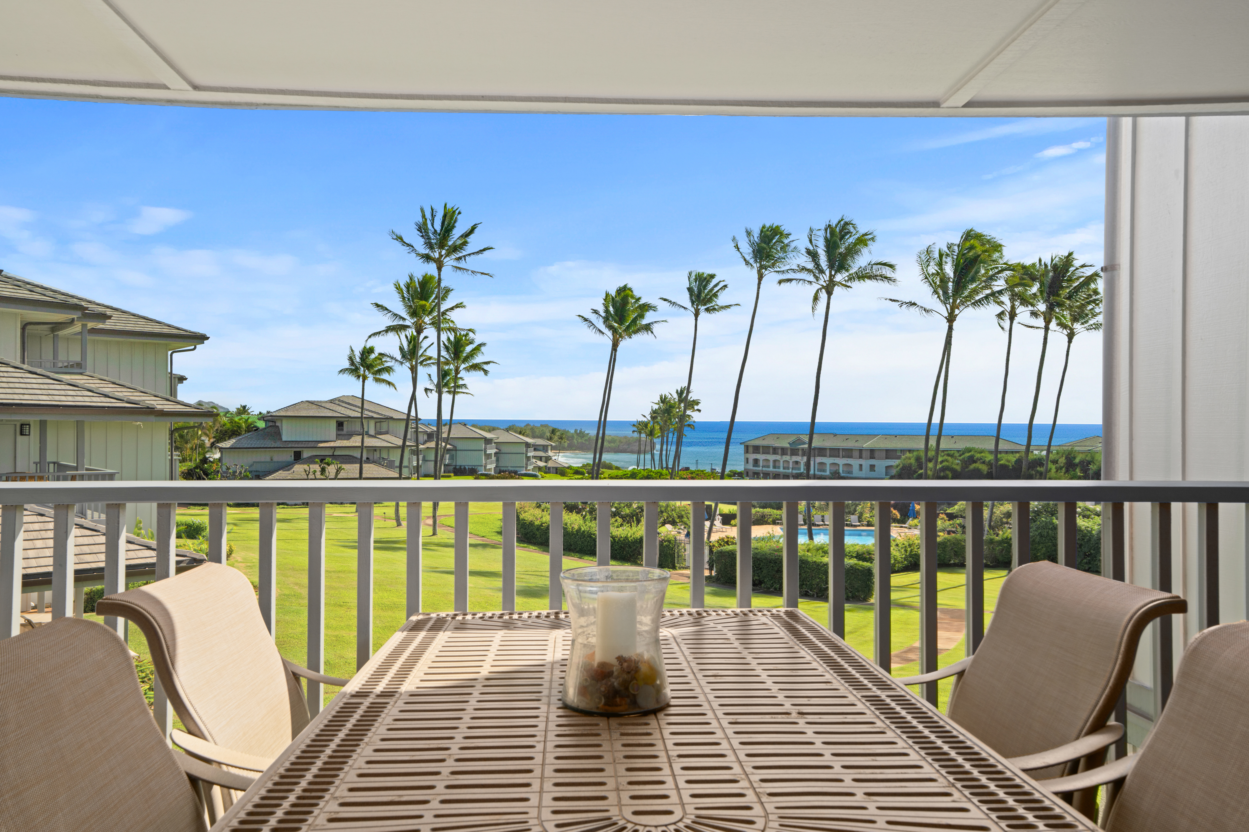 1565 Pe'e Road, Unit 125 Koloa, HI 96756 - Photo 18 of 20 a view of roof deck with mountain view and wooden floor