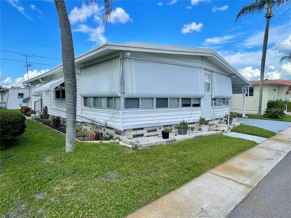 a house view with a garden space